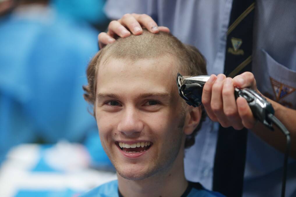 Close shave: An Inaburra student shows his support at last year's event. Picture: Chris Lane 