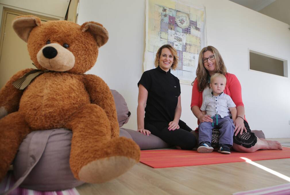 Motherly care: A new support group for women is launching in Sutherland Shire. It is run by Narelle Horwitz, who is pictured with son Brodie, and Belle Flowers. Picture: John Veage