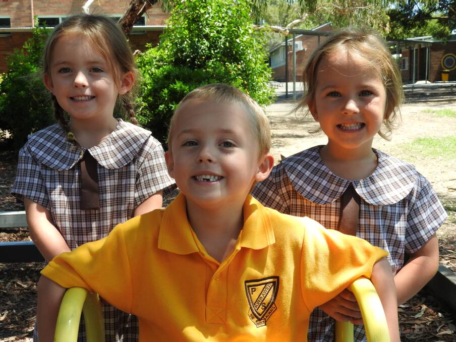 Family ties: Kirrawee Public School welcomes triplets Alexandra, Max and Charlotte Thorn to Kindy.