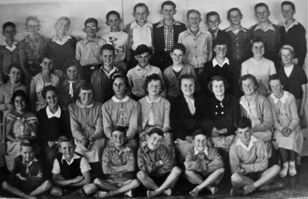School days: Former student of Gymea Bay Public School's 6th class of 1955, John Wright, pictured as a young boy, top row, fifth from left, hopes to hear from his fellow ex-peers.