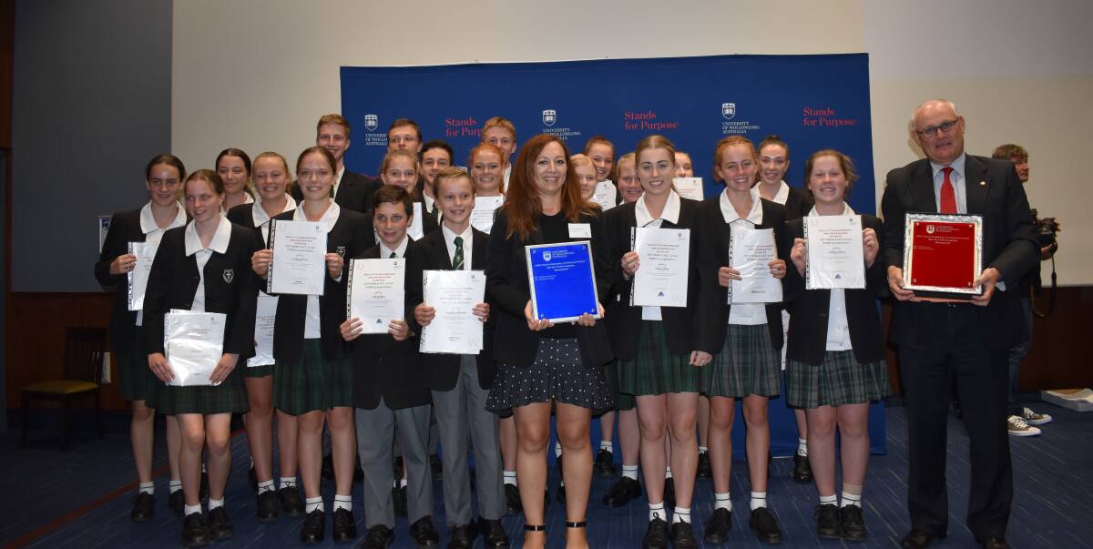 Job well done: St John Bosco College Engadine proudly accept their awards for their work in STEM education.