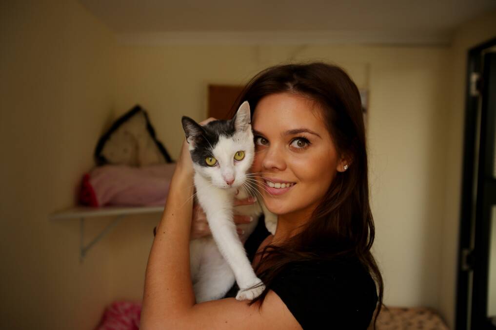 Vital service: Sophie Katrakis-Mol from Sydney Dogs and Cats Home with Patch. The shelter has launched a petition to expand. Picture: Chris Lane