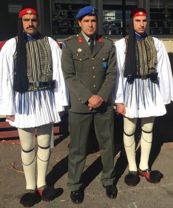 Guests: Members of the Greek Presidential Guard visit Sans Souci Public School.