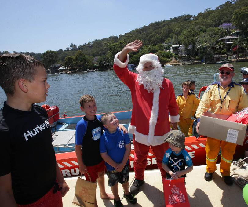 Special guest: Santa will join the Woronora Rural Fire Service for the annual Christmas Santa Run.Picture: John Veage