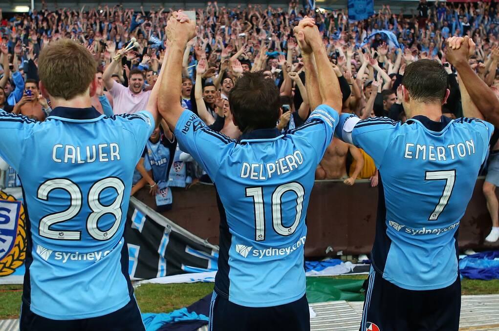 Aaron Calver, Alessandro Del Piero and Brett Emerton of Sydney FC celebrate with the fans following match against Melbourne Heart at Allianz Stadium in January 2013. Picture: Brendon Thorne/Getty Images