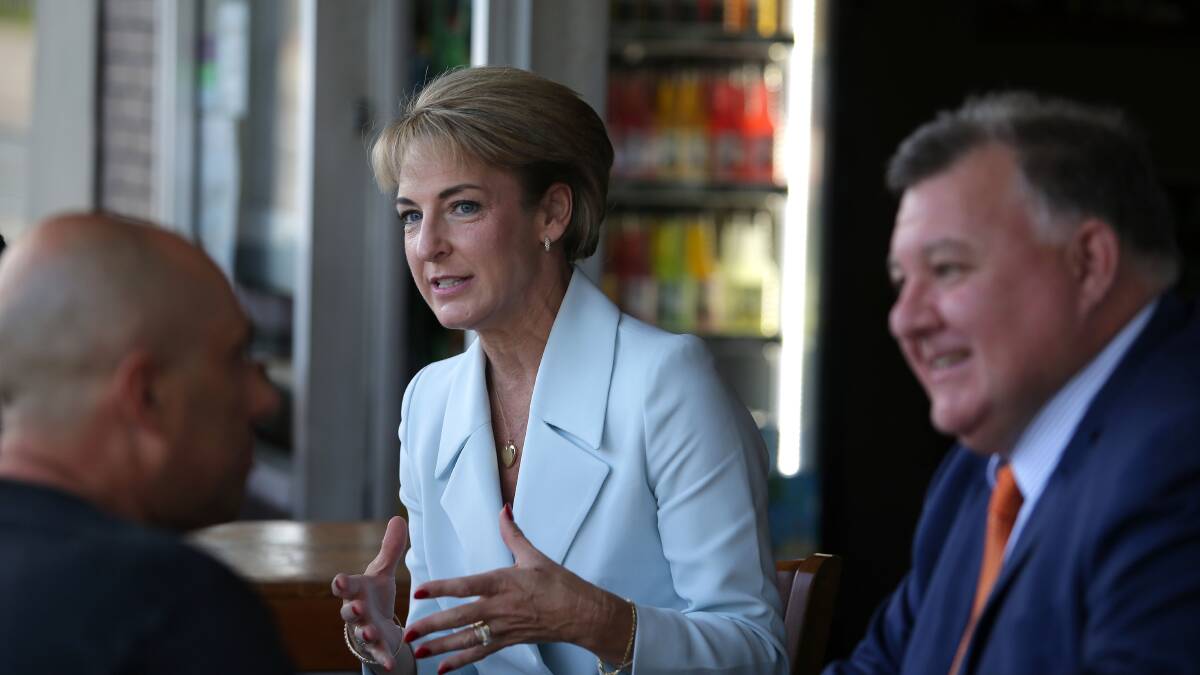 Meeting the locals: Federal Minister for Employment, Senator Michaelia Cash with Hughes MP Craig Kelly, listened the the concerns of local small business-owners during her visit to Sutherland yesterday. Picture: John Veage