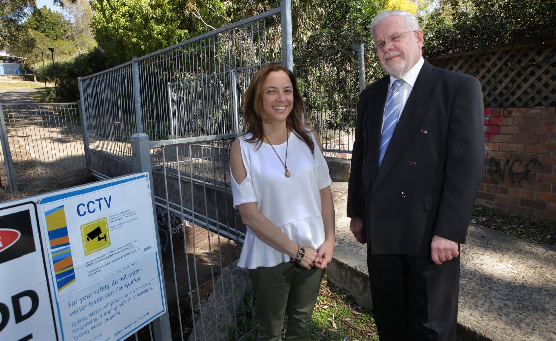 Good result: Vicki Herrmann and Marist College Principal John Riordan have welcomed the new security cameras at Frys Reserve in Kogarah. Picture: John Veage