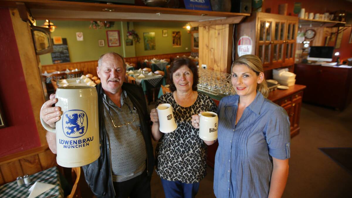 Stein of the times: Gunter, Margaret and Monika give a final toast to their loyal customers. Picture: John Veage