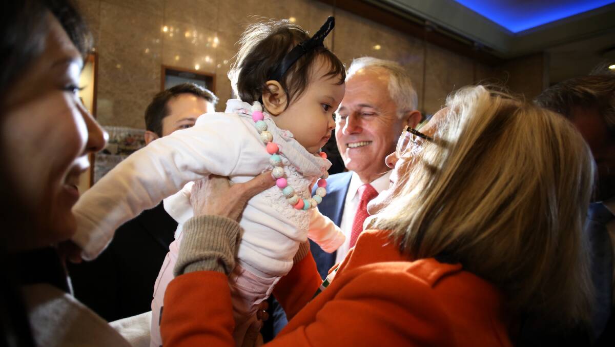 Lucy and Malcolm Turnbull with granddaughter Isla at Hurstville. Picture: Andrew Meares
