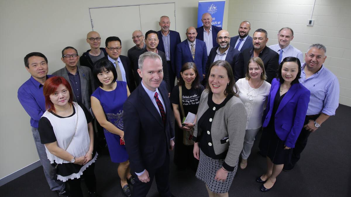 Concerns aired: David Coleman and federal minister Kelly O’Dwyer (front) with participants in the small business forum, which was held at Club Central, Hurstville. Picture: John Veage