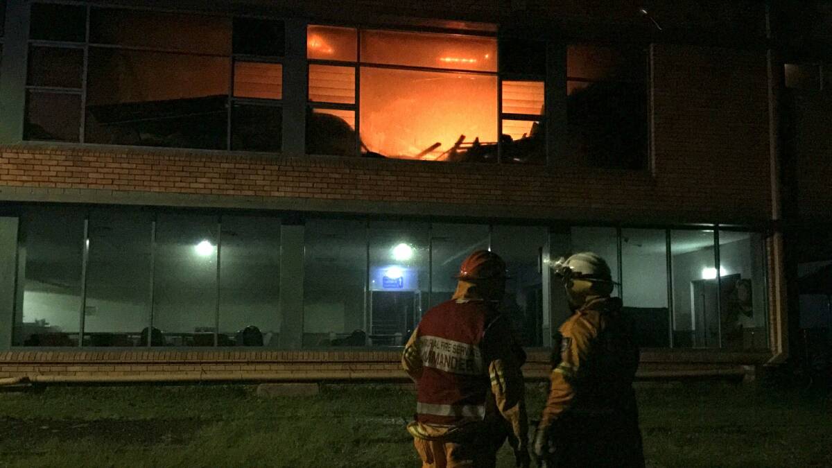 Gutted: Firefighters battle a fire at Bundeena RSL Memorial Club in February last year. Picture: Scott Deller, Rural Fire Service