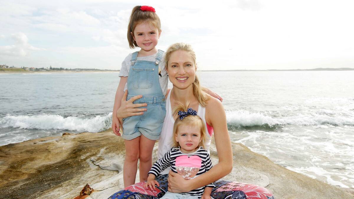 'Appy' mum: Kimmy Smith with Allegra, 4, and Samara, 2, at Cronulla, is building a business career after playing for the Sandpipers and Sydney Swifts and being a member of the Australian team squad. Picture: Chris Lane