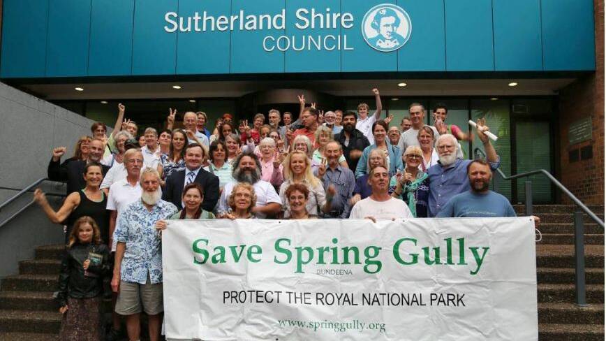 Residents fighting to stop an eco-tourism resort at Bundeena, outside Sutherland Shire Council chambers in 2015.
