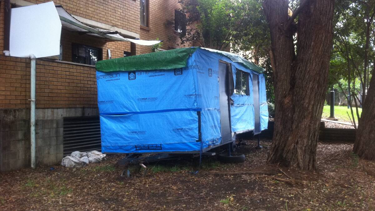 The caravan is parked next to the balcony of the unit in Banksia Avenue. Picture: supplied