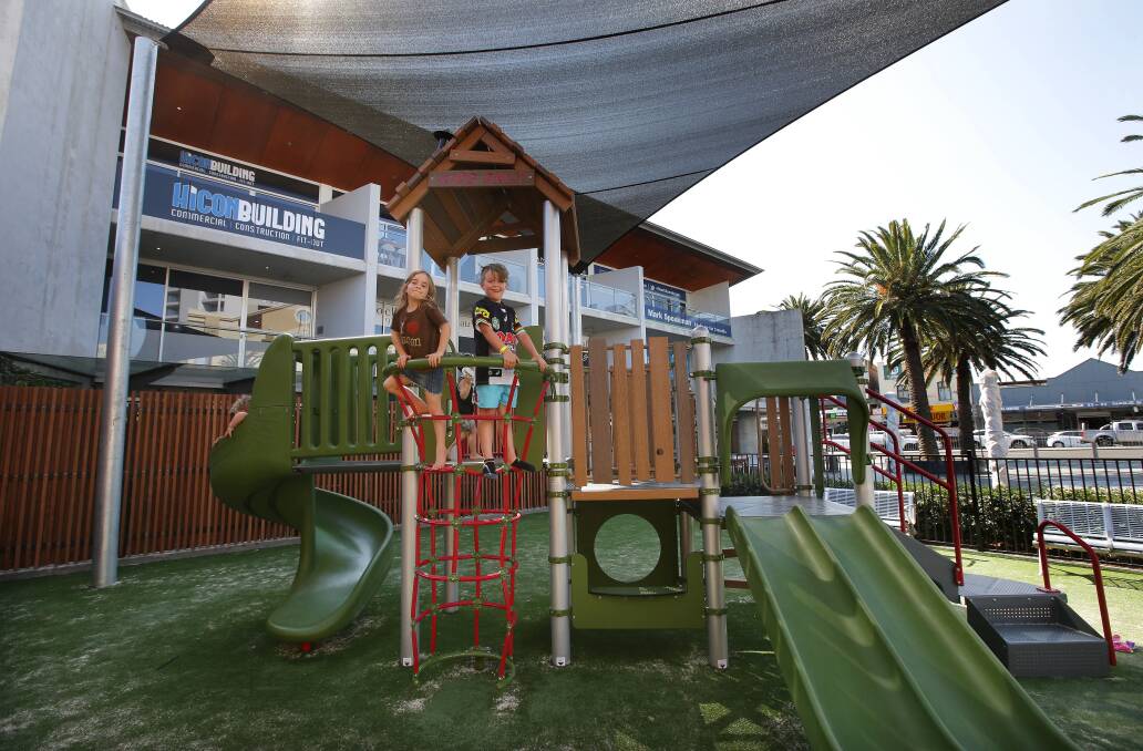 In place: Winter, Eden and Remmy enjoy the new playground on the site of the former women's health centre at the top of the mall. Picture: John Veage