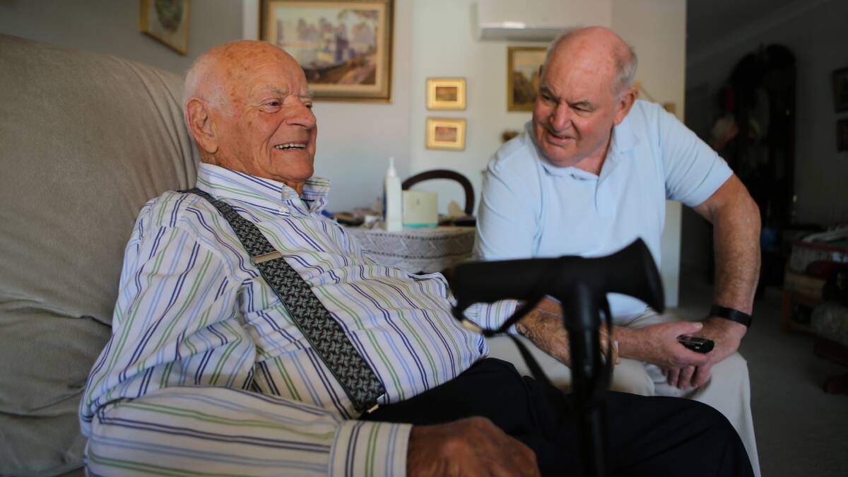 Frank Mawer in his Gymea home with volunteer biographer Tim Higgins. Picture: John Veage
