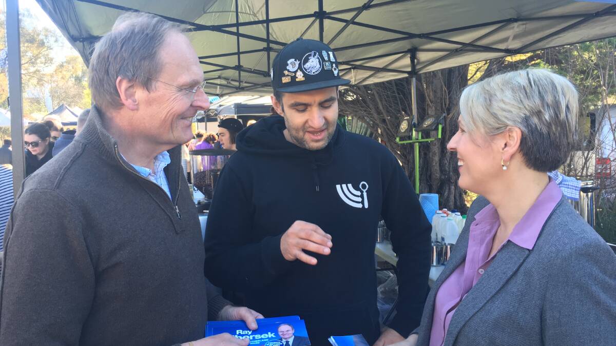 Sisterly support: Ray and Tanya Plibersek chat with Domnic from White Horse Coffee at Shire Farmers' Market. Picture: supplied