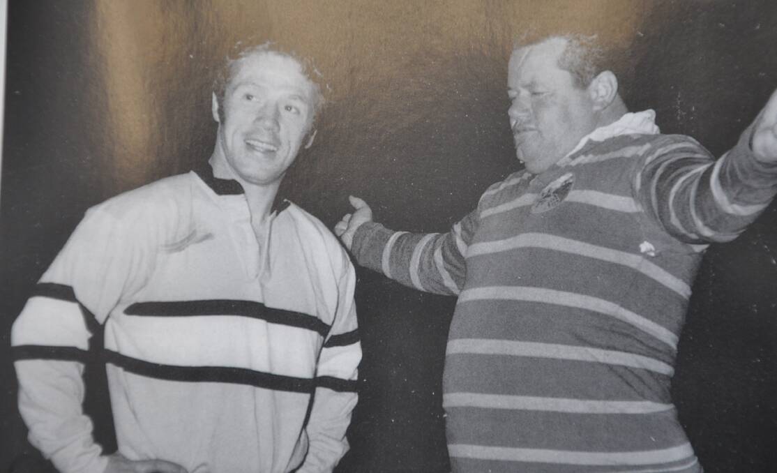 Creative flair: Ken "Killer" Kearney, pictured with Tommy Bishop at the star's first training session in June 1969, is credited with calling the club the Sharks.