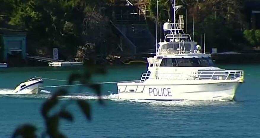 Water Police tow the boat back to port. Picture: 9 News