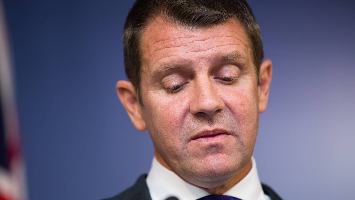 Premier Mike Baird is emotional at a media conference after announcing his resignation. Picture: Janie Barrett