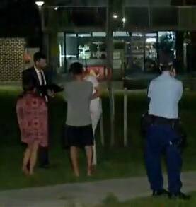 Detectives question people at the scene. Picture: 9 News
