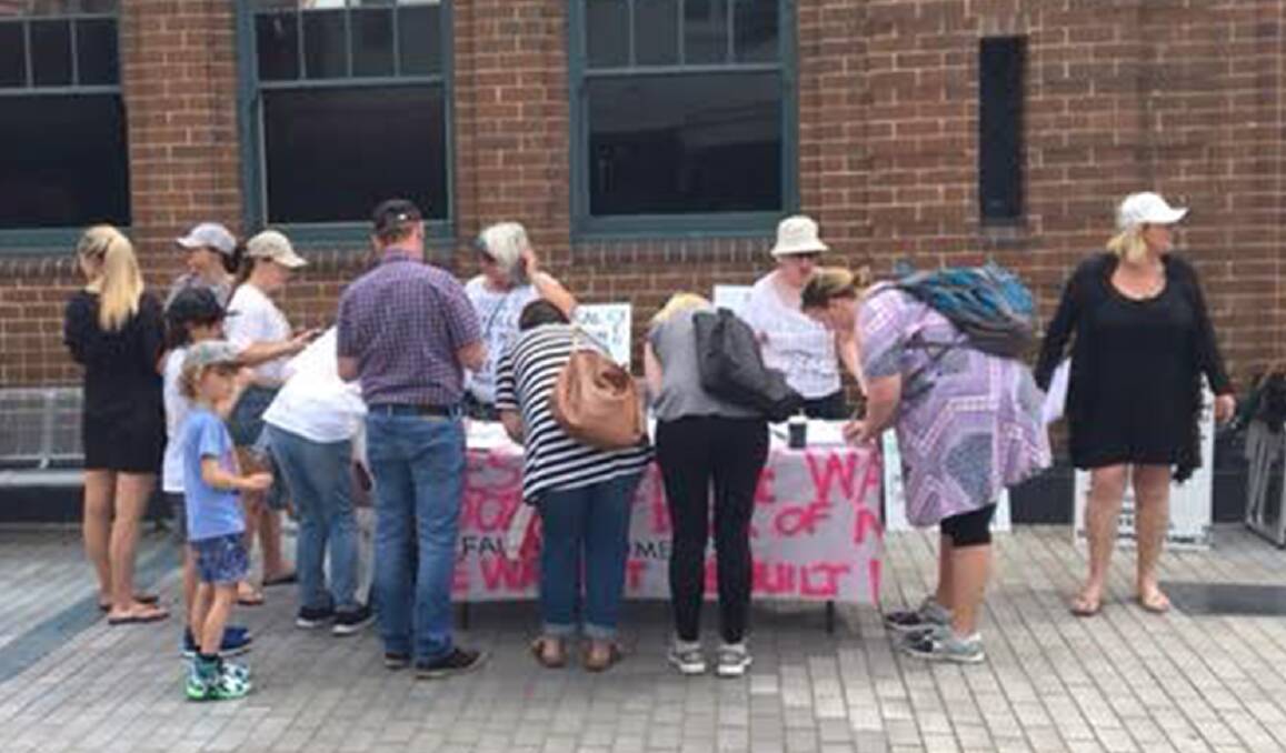 People power: Signatures for the petition calling for the Cronulla Women’s Rest Centre to be rebuilt are collected at a stall in the mall. Picture: supplied