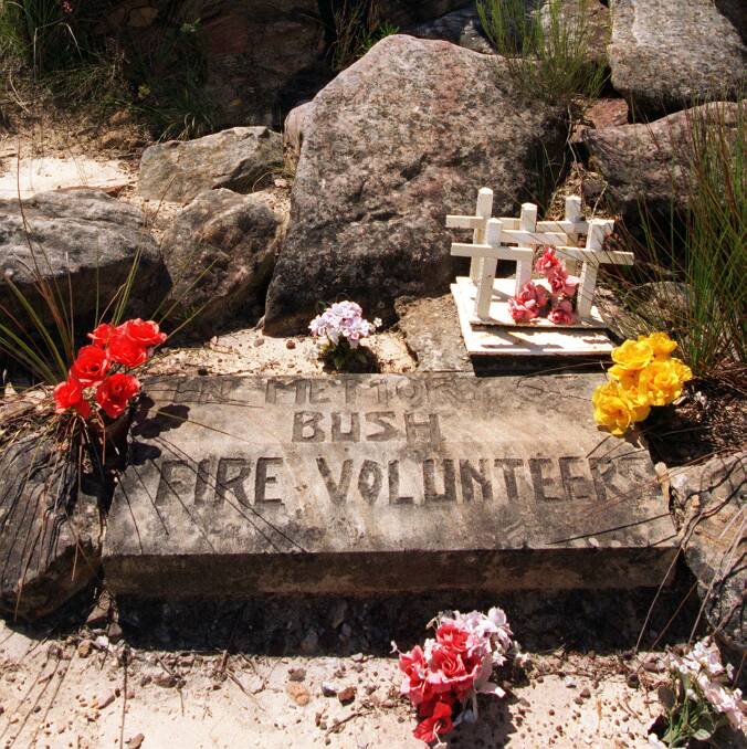 Similar fire path: Memorial to the five volunteer firefighters who died on the Uloola Trail at Waterfall in 1980. Picture: Robert Pearce