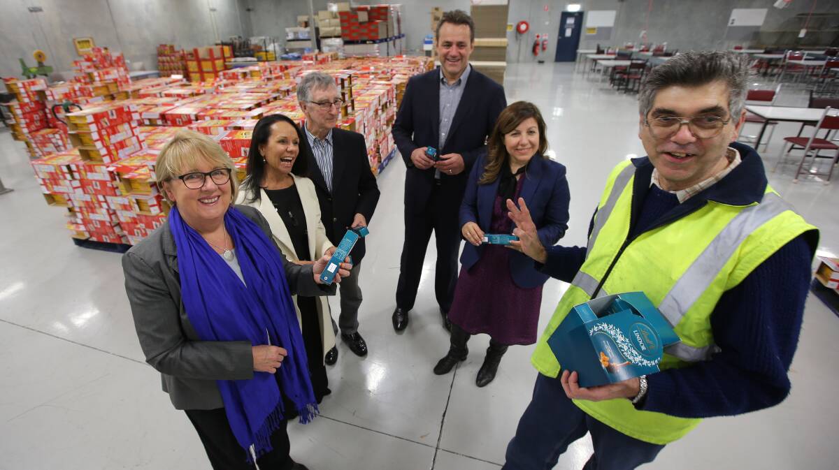 Kogarah visit: Con Karpouzos, a worker at The Intellectual Disability Foundation of St George, with Jenny Macklin (left), Linda Burney, Michael Dennis (chairman), Steve Kamper and Sophie Cotsis. Picture: John Veage