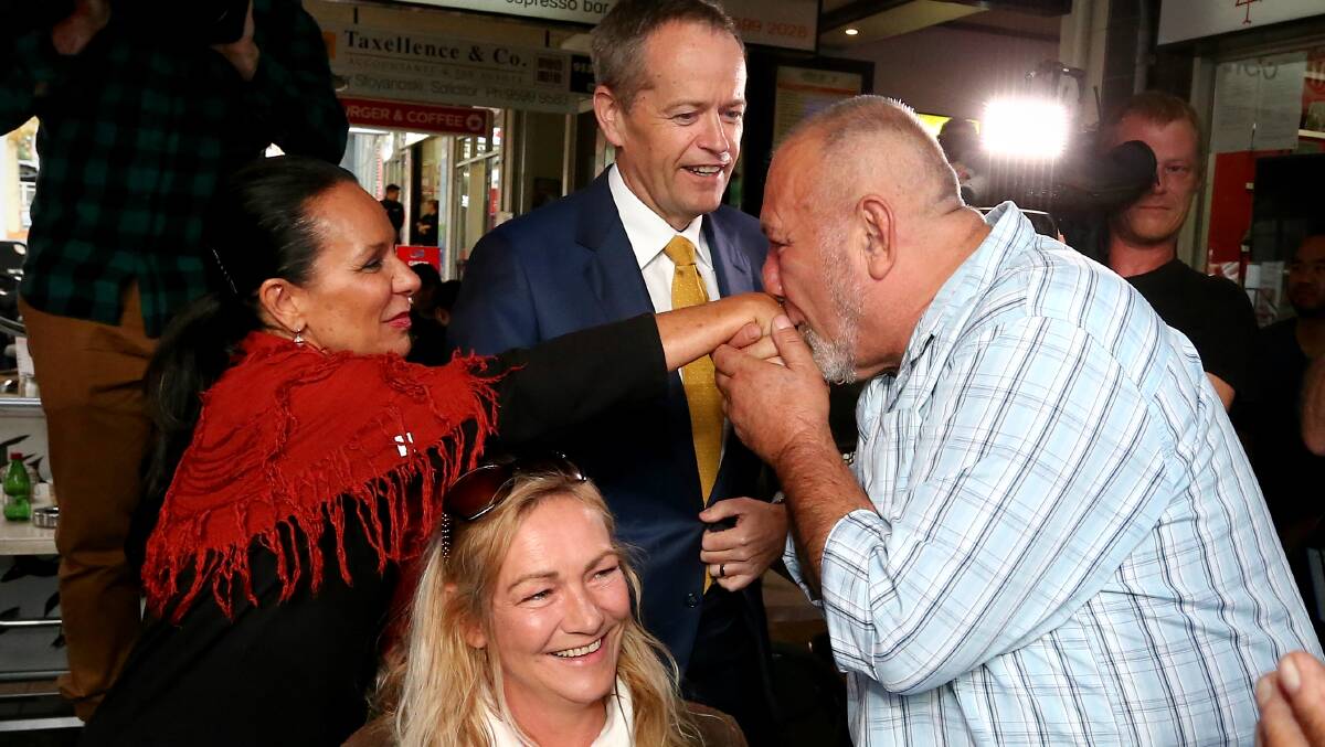 Warm welcome: Linda Burney is kissed on the hand by Labor supporter Jordan Trajkovski who was celebrating his 63rd birthday. Picture: Alex Ellinghausen