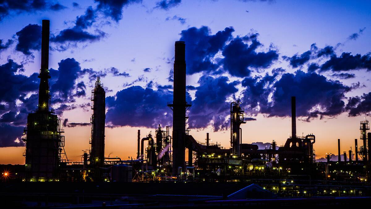 Memories remain: Karl Braasch, a Caltex employee, captured this image of the refinery at sunset.
