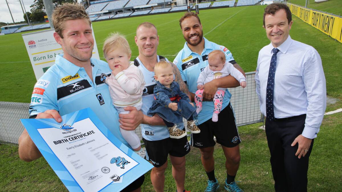Jeremy Latimore with Everly, Luke Lewis with Hazel and Sam Tagatese with Faith were presented with commemorative certificates by Mark Speakman. Picture John Veage