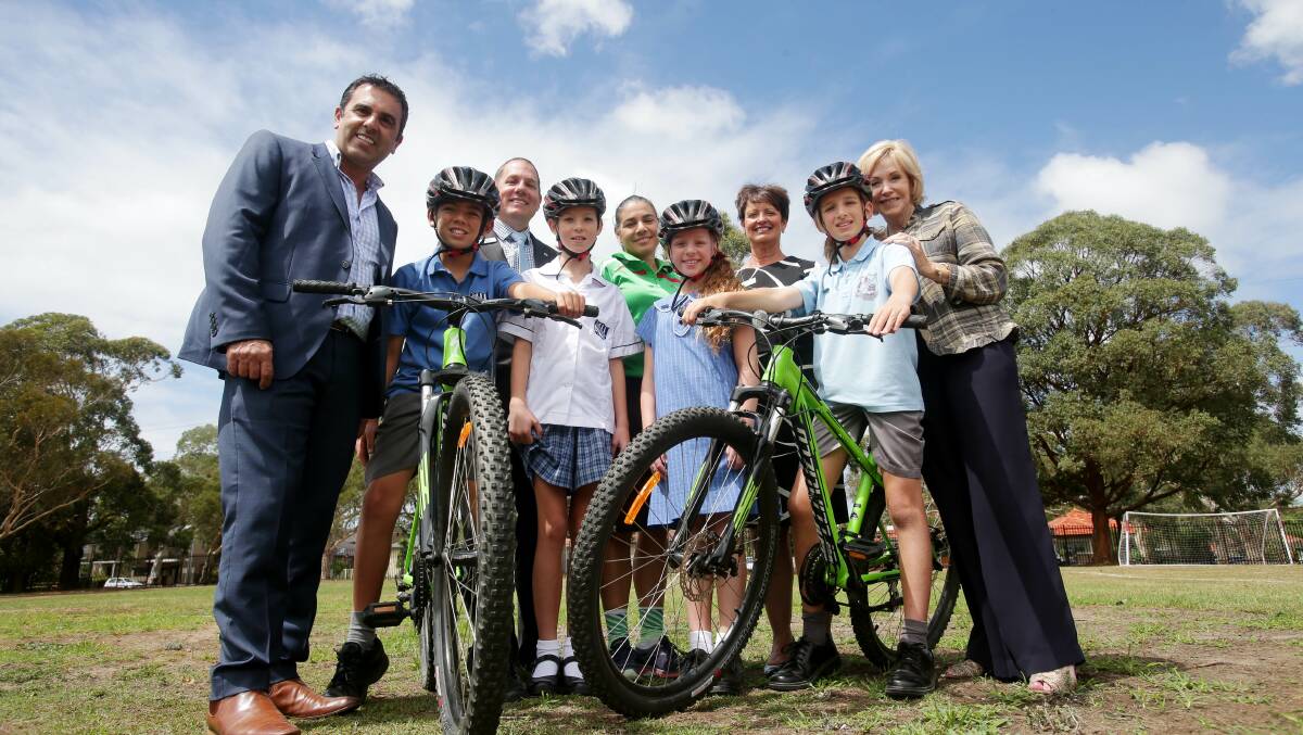 Cycle to School Project launch: Front: School captains Samuel Niumataiwalu and Olivia Davey (Woolooware PS) and Kiera Dzeparoski and Orlando Santilli (Sutherland North PS). Rear: Cr Carmelo Pesce, Jason Ezzy, Rebecca Randazzo, Fiona Young and Cr Carol Provan. Picture: Chris Lane