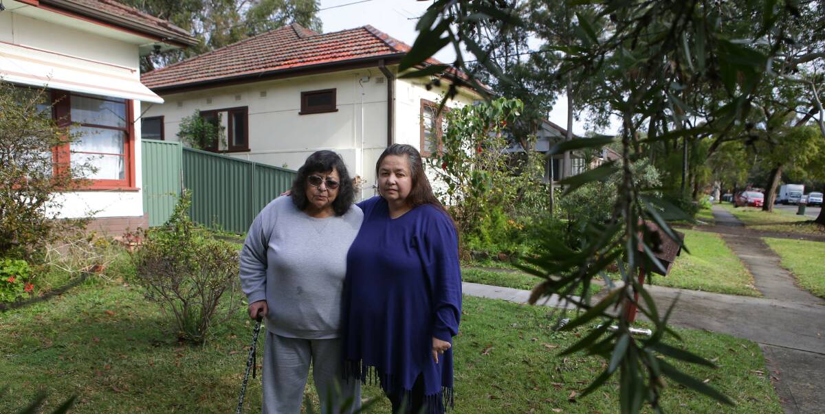 Appeal against plans: Anita Gregor and her mother Ligia Amaya in front of their View Street home, with houses to be demolished for the new development in the background. Picture: John Veage