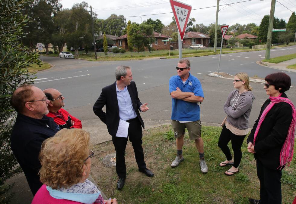 Budget funding: David Coleman discusses the budget allocation with residents at the corner of Belmore Road and Clarendon Road, Peakhurst. Picture: John Veage