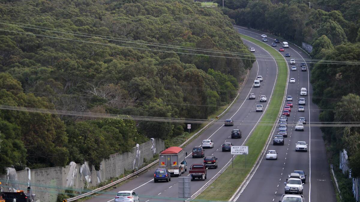 The Princes Highway sweeps past the Royal National Park at Kirrawee. Picture: John Veage