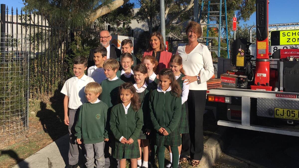 Melina Pavey (right), Eleni Petinos  and the executive director of the Centre for Road Safety, Bernard Carlon, with pupils at Taren Point Public School. Picture supplied