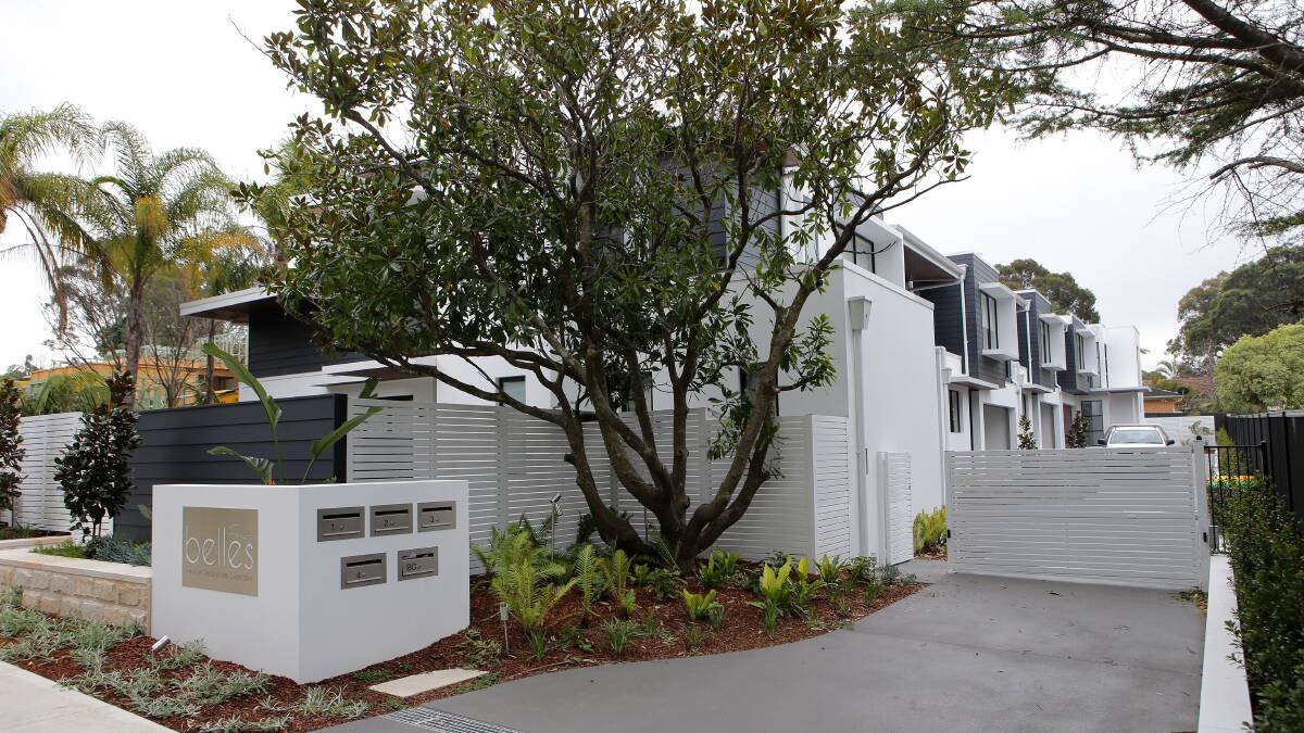 Changing landscape: A completed townhouse project in Actinotus Street, where only five properties have not been bought by developers. Picture: John Veage