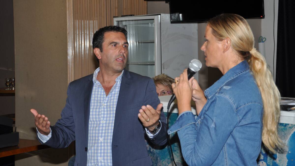 Mayor Carmelo Pesce and Save Heathcote East co-convener Kelly Ferguson at a community meeting in May this year, where Cr Pesce said he was personally opposed to the Heathcote Hall development.