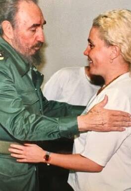 Susie Maroney is greeted by Fidel Castro in 1999.