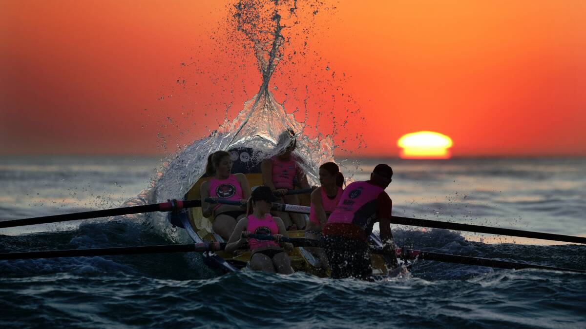 Beautiful beaches: A North Cronulla crew takes to the water for early morning training. Picture John Veage