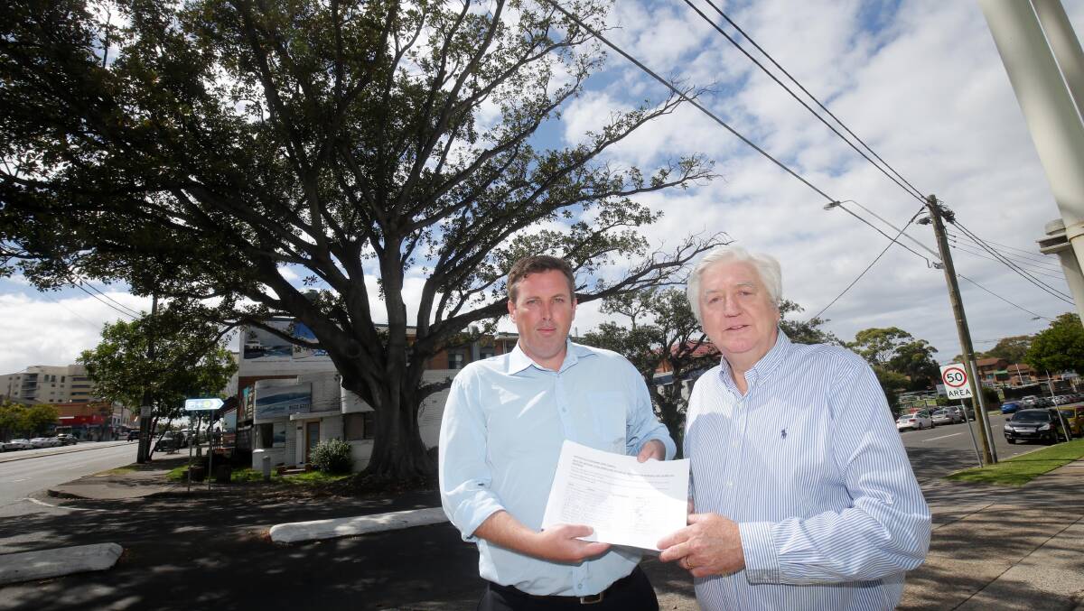 Nathan Hunt (left) and Cr Michael Forshaw, who will present the petition to the council. Picture: Chris Lane