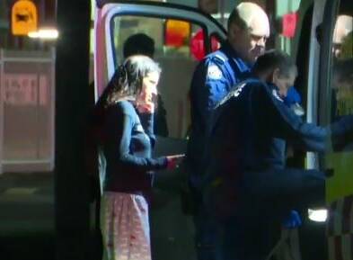 The victim is placed in an ambulance by paramedics. Picture: 9 News