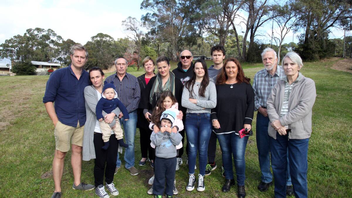 Residents in a park at the corner of Rulwalla Place and North West Arm Road, Gymea, where an exhaust stack is proposed. Picture: Chris Lane