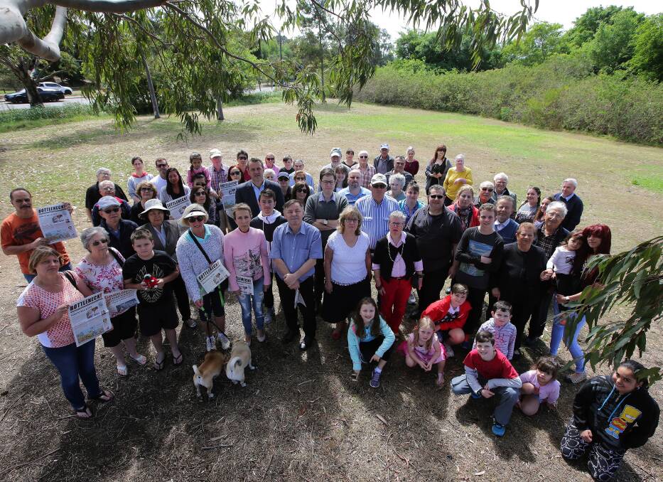 F6 fears: Residents, with Bayside Council mayor Bill Saravinovski and councillors Liz Barlow and Ed McDougall, on a possible interchange site at the corner of President Avenue and Civic Avenue. Picture: John Veage