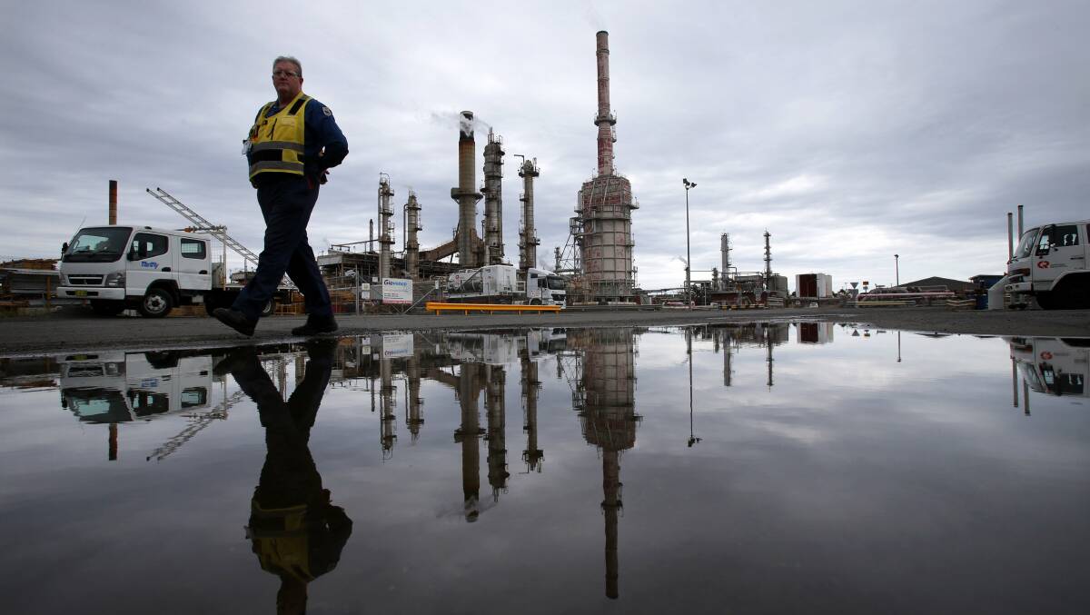 Sad day: Leader photographer Jane Dyson's haunting image of the refinery closure in 2014. 