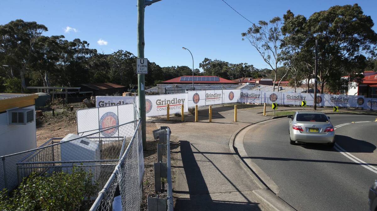 No way through: The frequently used entry point to Royal National Park is a dirt car park on the eastern side of the rail bridge, across from McDonald's. Picture: John Veage