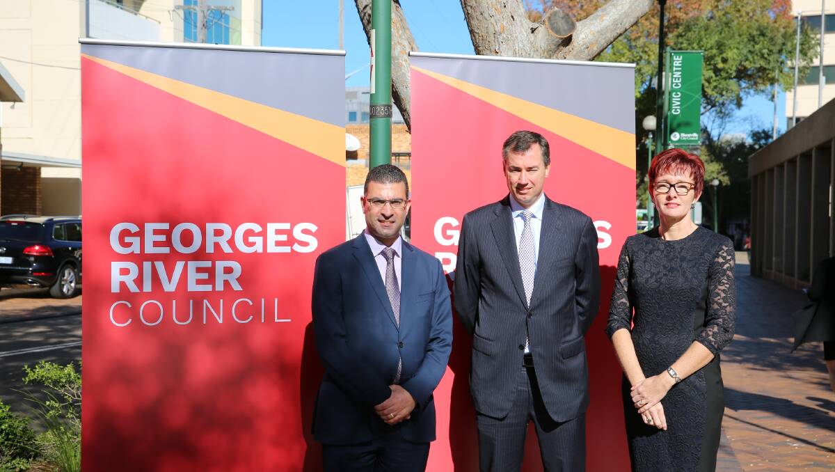 CCTV promise: Nick Varvaris (left), Justice Minister Michael Keenan and Georges River Council interim general manager Gail Connolly. Picture: supplied