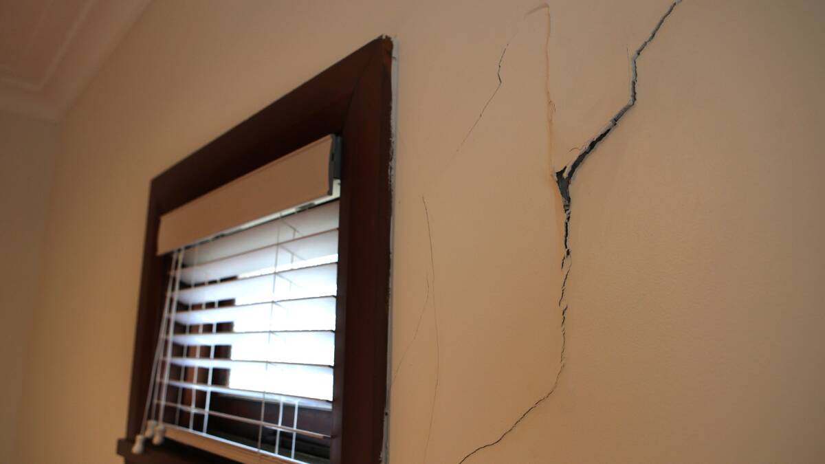 Floor to ceiling crack in the home of Christine and Allen Wong Wan Po. Picture: John Veage