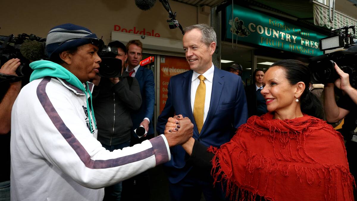Warm welcome: Nelson Warson greets Bill Shorten and Linda Burney in King Street Mall. Picture: Alex Ellinghausen 