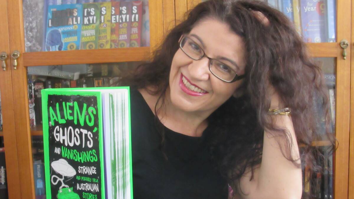 Strange tales and incredible encounters: Kogarah Bay author Stella Tarakson with her new book.
